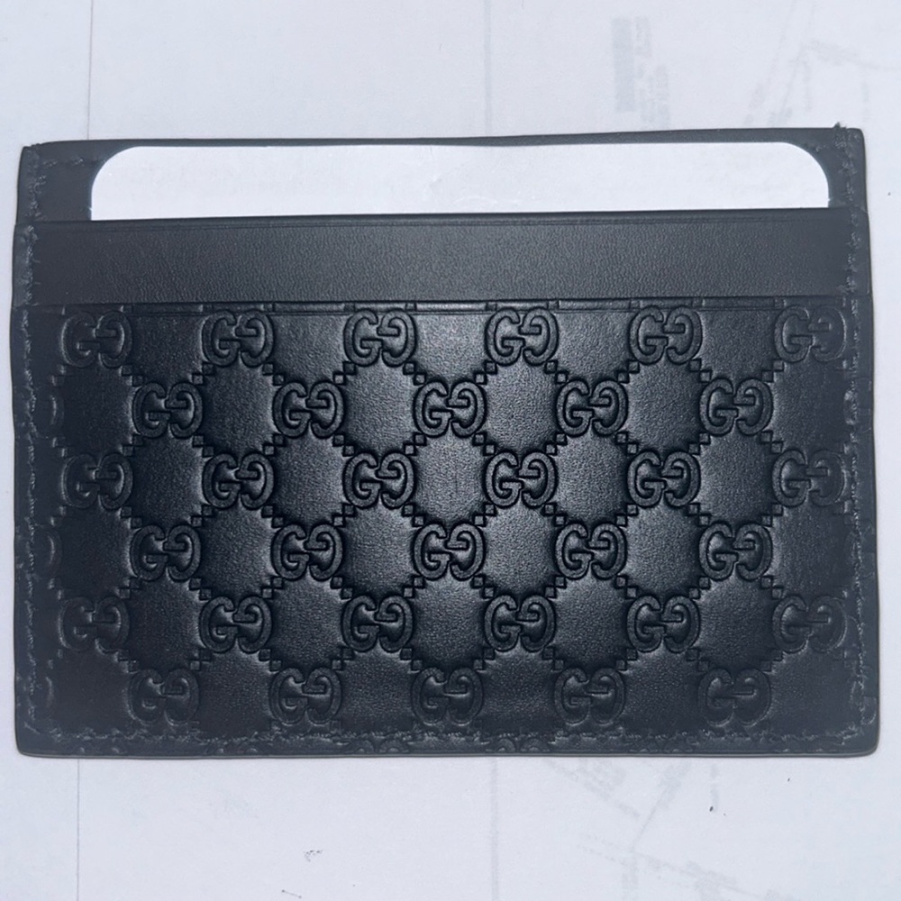 New micro Guccissimo leather card holder
